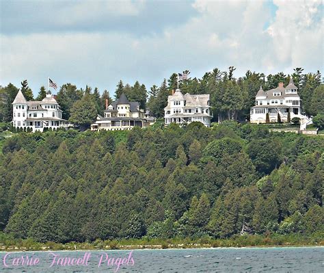 Victorian homes on the bluffs on Mackinac Island, near the Grand Hotel ...