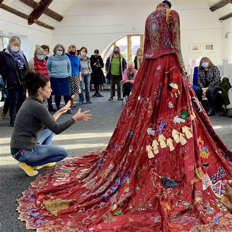 This ornate red dress took 13 years and 353 artists in the making