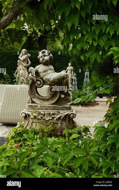 stone garden sculptures in landscape design in the park Stock Photo - Alamy