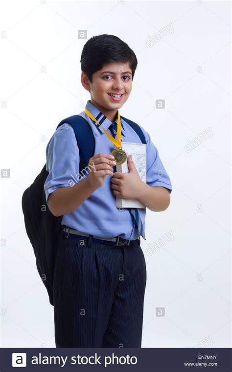 Download This Stock Image Portrait Of School Boy With Medal En7mny