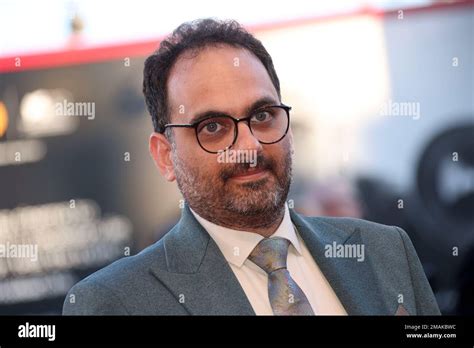 Reza Heydari Poses For Photographers Upon Arrival At The Premiere Of