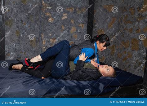 Two Lesbian Girls Making Love On A Black Bed In Their Bedroom Stock Image Image Of Alternative