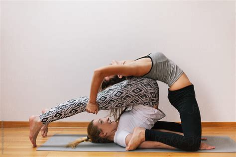 Two Women Doing Yoga Together Del Colaborador De Stocksy Marija