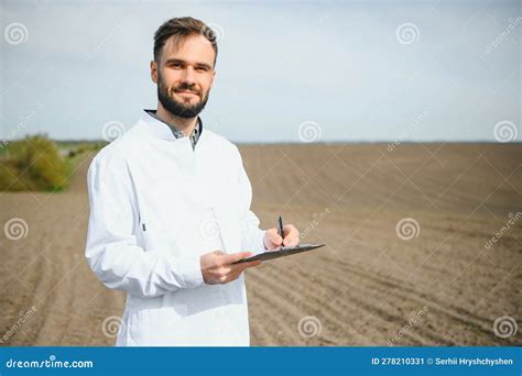 Soil Testing Agronomy Specialist Taking Soil Sample For Fertility