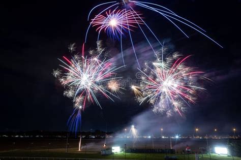 Vibrant Night Sky Illuminated By An Array Of Colorful Fireworks