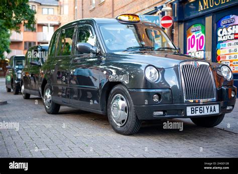 Black Cabs For Hackney Carriage Oxford City Council Queueing At A Taxi