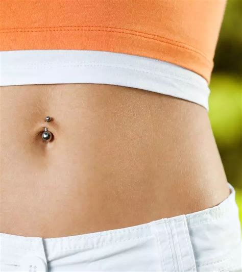 How To Take Care Of A Belly Button Piercing Aftercare Tips