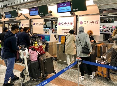 Chek In Desk At Qatar Airways Company For Doha Flight Inside The Milan