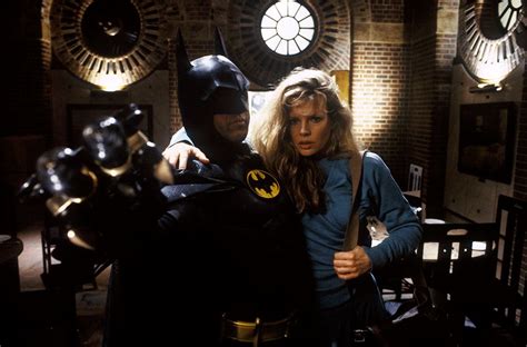 Batman (Michael Keaton) rescues Vicki Vale (Kim Basinger) from the Joker and his goons. Batman ...