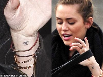 Miley Cyrus' Tattoos & Meanings | Steal Her Style