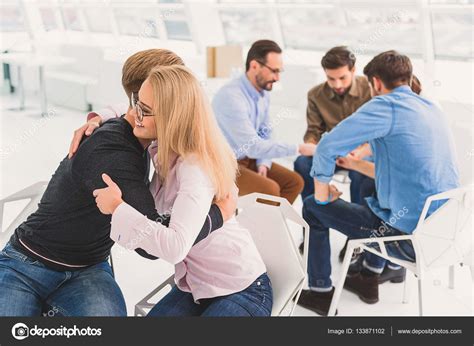 Two people hugging with pleasure Stock Photo by ©iakovenko123 133871102