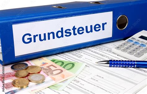 Grundsteuer Ordner Mit Geld Und Taschenrechner Stock Photo Adobe Stock