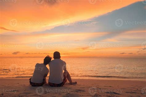 Couple In Love Watching Sunset Together On Beach Travel Summer Holidays People Silhouette From