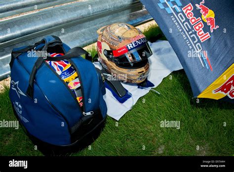 The Race Helmet And A Spare One Of German Formula One Driver Sebastian