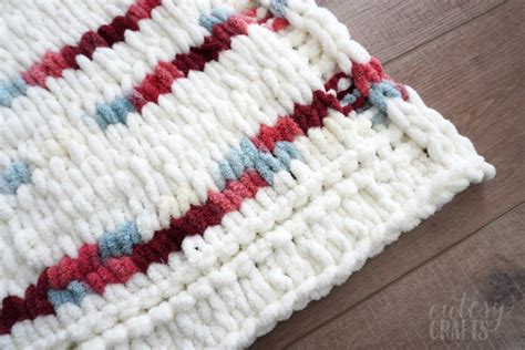 How to Make a Loop Yarn Blanket - Cutesy Crafts