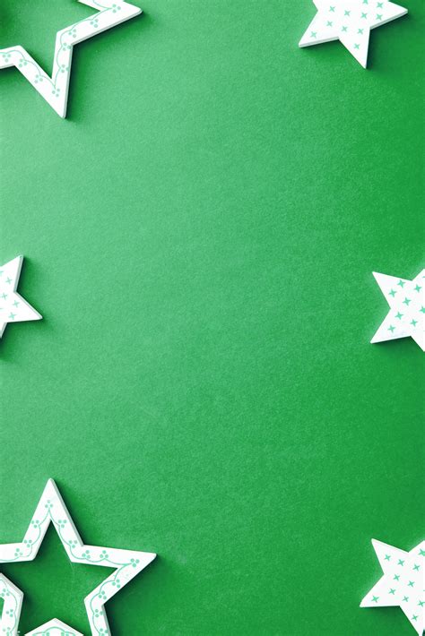 Photo of Decorative polka dot star border on green | Free christmas images