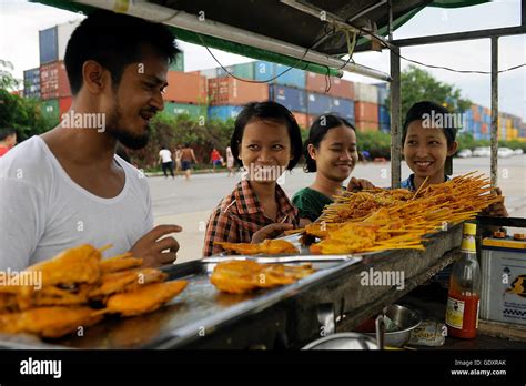 2014 A Streetfood Vendor In The Former Burmese Capital Hi Res Stock