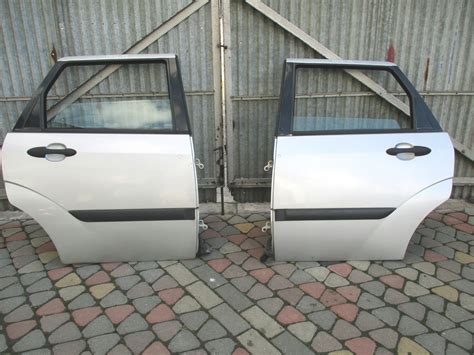 FORD FOCUS MK1 LIFT DRZWI TYŁ LEWE PRAWE KOMBI 08 08 MOONDUST SILVER za