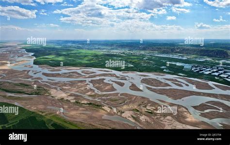 YUNCHENG CHINA JUNE 28 2022 Sun Rays Shine Through Clouds On The