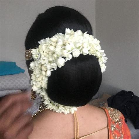 Pin On Indian Low Bun Hair Styles Bridal Hair Buns Indian Makeup