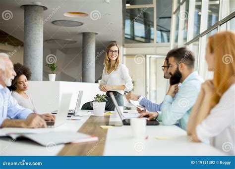 Joyful Multiracial Business Team At Work In Modern Office Stock Photo