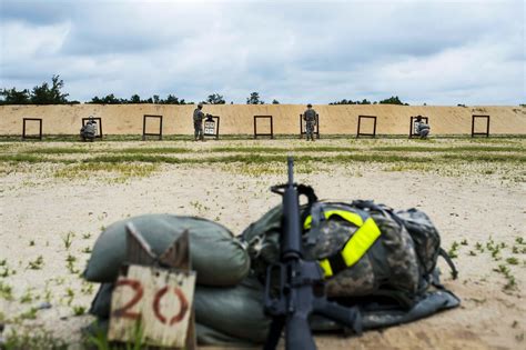 Soldiers Check Their Zero Targets On The M16 Rifle Range During The