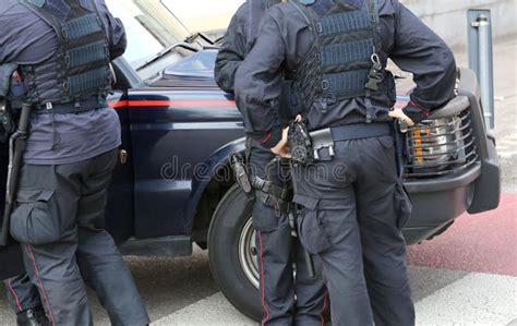 Policeman In Riot Gear During A Roadblock To Control In National Stock