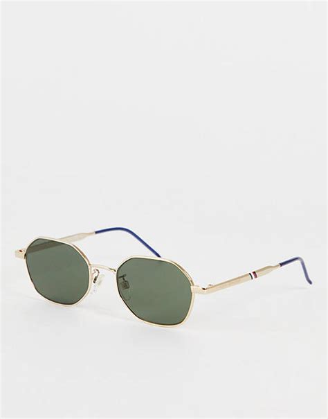 Tommy Hilfiger retro round sunglasses in gold | ASOS