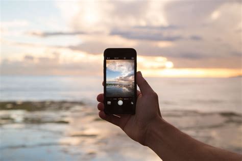 Ilmaisia Kuvia mobile käsi ranta meri rannikko hiekka valtameri