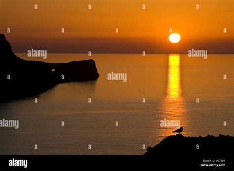 Sunset at Worm's Head, Gower, Wales Stock Photo - Alamy