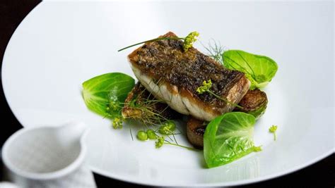 Crispy Barramundi With Sprouts Pancetta And Prawn Broth