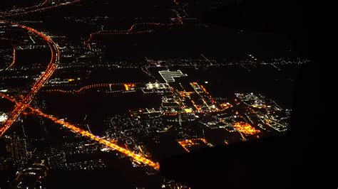 View of the airplane window over the city at night. 3735162 Stock Video ...