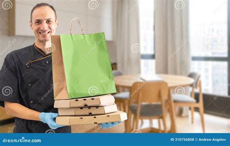 Box With Fast Food Being Carried By Delivery Man In Uniform For One Of