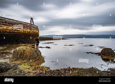 Abandoned Old Fishing Boats Rotting On The Shore Of The Sound Of Mull