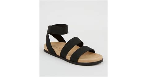 Wide Fit Black Elastic Strap Footbed Sandals New Look