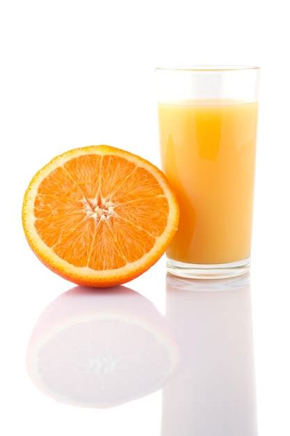 Premium Photo Glass Of Orange Juice And Orange Slice Isolated On White