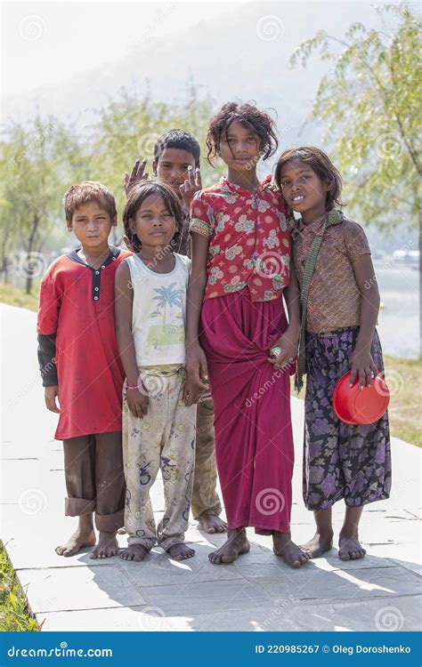 Poor Nepalese Girl On The Street In A Himalayan Village Nepal