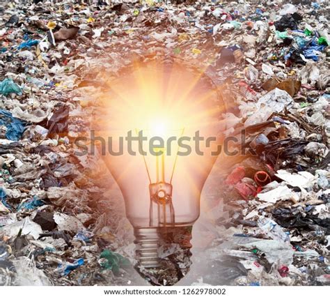 Lighted Bulb And Waste To Express The Recycling Concept And Garbage