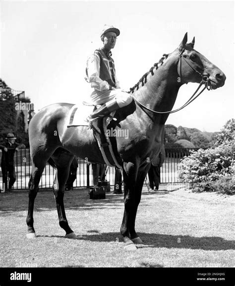 American racehorse Seabiscuit and jockey Johnny "Red" Pollard are shown ...