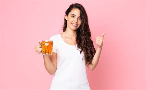 Premium Photo Pretty Young Woman Holding A Beer Pint