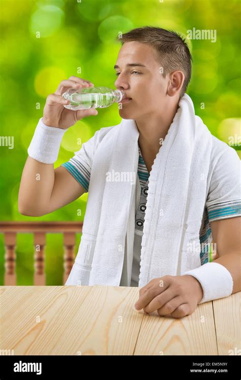 A Guy Drinking Water Stock Photo Alamy