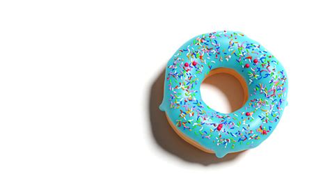 Closeup Donut With Blue Icing Isolated On White Background Top View