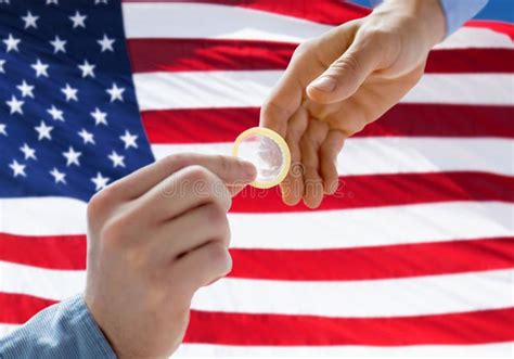 Close Up Of Male Gay Couple Hands Giving Condom Stock Photo Image Of Male American