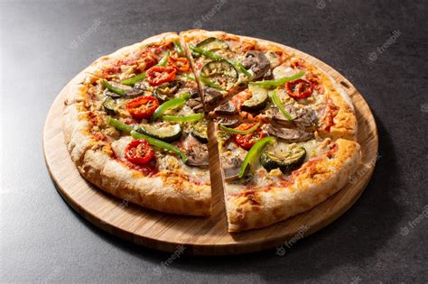 Premium Photo Vegetarian Pizza With Zucchini Tomato Peppers And Mushrooms