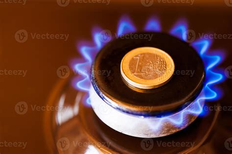 Gas Stove Burner With One Euro Coin Laid On Top Burning Natural Gas