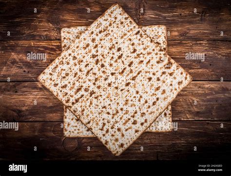 Two Pieces Of Jewish Passover Matzah Unleavened Bread In Form Of