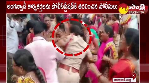 High Tension At Adilabad Collectorate Si Vs Anganwadi Workers