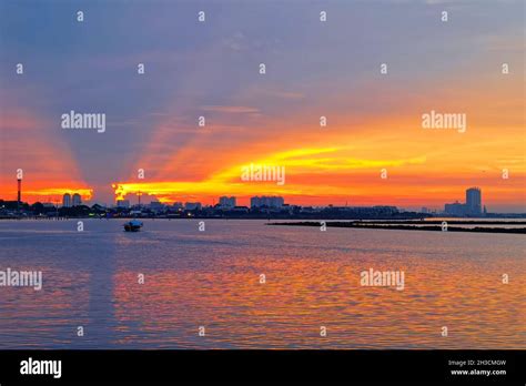 Sunset Pantai Ancol Beach, Jakarta, Indonesia Stock Photo - Alamy