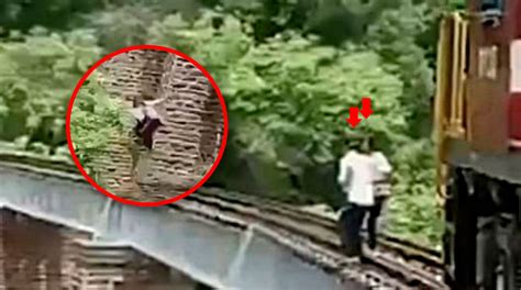 Pareja Salta De Puente Para Evitar Ser Arrollada Por Un Tren En India