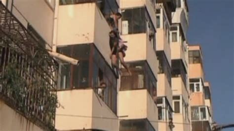 Couple Rescued As They Fall From Balcony Window Youtube